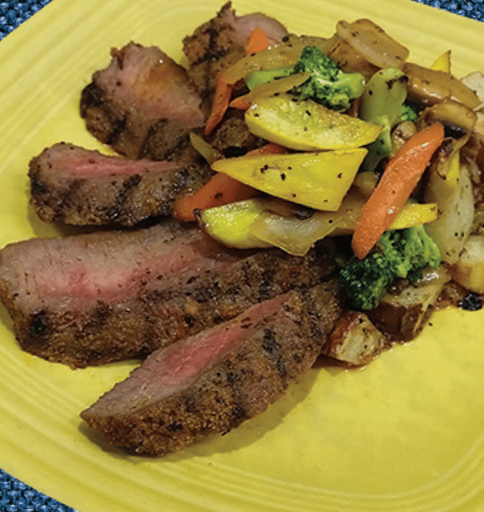 Pepper Crusted Top Sirloin with Roasted Potato Hash & Siracha and Honey Vegetables